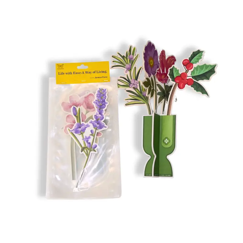 Components of flower-shaped paper air freshener, vase and stems