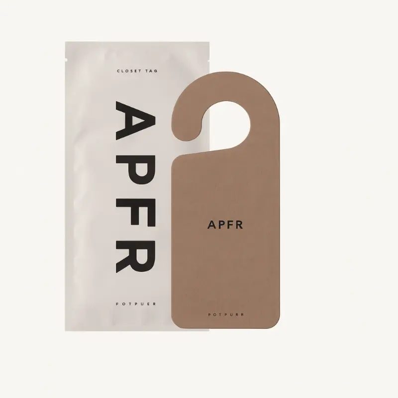 APFR Oakmoss & Amber door hanger air freshener with minimalist pouch packaging