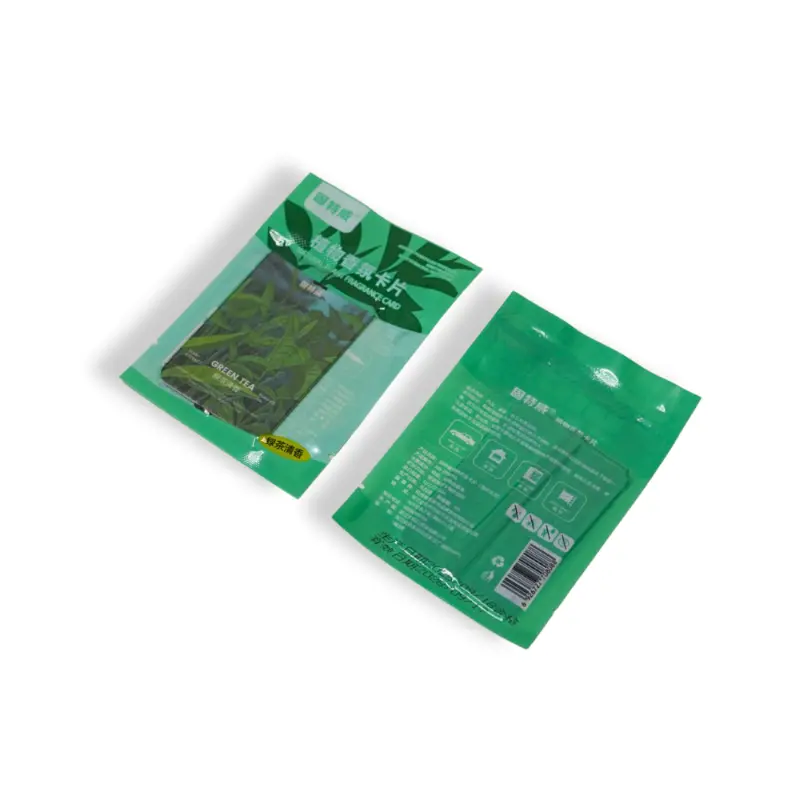 Green tea fragrance air freshener packaged in a green printed retail pouch