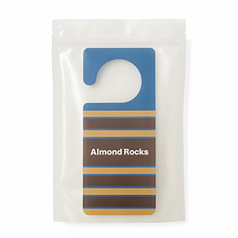 Almond Rocks air freshener sealed in minimalist hotel-style packaging
