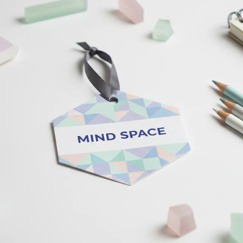 Fresh-themed office paper air freshener hanging on desk lamp