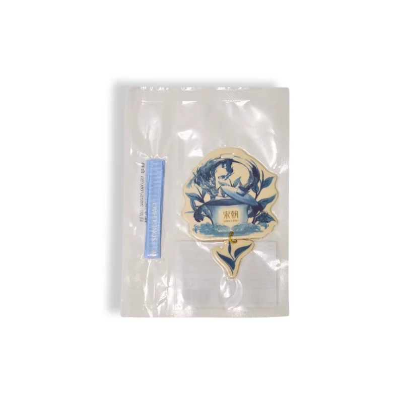 Irregular-shaped Chinese blue art car air freshener in retail packaging – back view with ribbon strap
