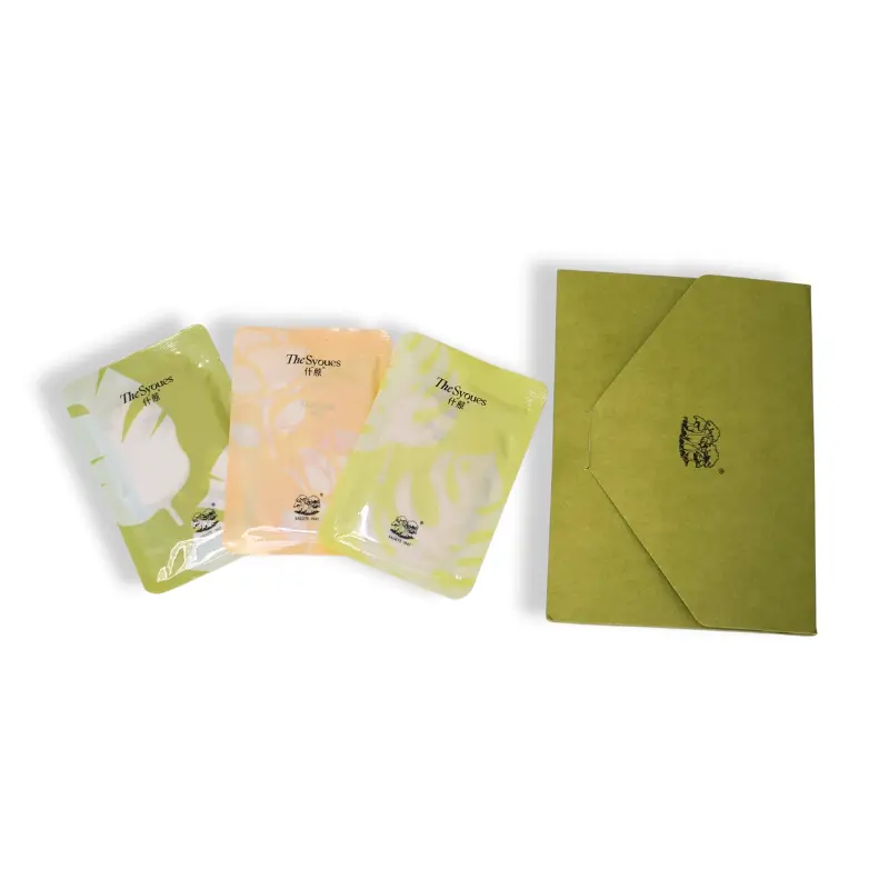 Vacuum packed fragrance card set with green envelope